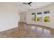 Bright dining room with tile floors and large windows offering scenic views at 41253 N Whistling Strait Ct, Anthem, AZ 85086