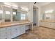 Double vanity bathroom with a soaking tub and a separate shower at 41253 N Whistling Strait Ct, Anthem, AZ 85086