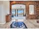 Spacious living room with stone accents and mountain views at 3220 W Feather Sound Dr, Anthem, AZ 85086