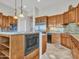 Built-in microwave and granite countertops highlight this kitchen at 3220 W Feather Sound Dr, Anthem, AZ 85086
