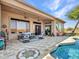 Spacious patio with outdoor furniture and pool access at 3220 W Feather Sound Dr, Anthem, AZ 85086