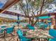 Relaxing pool area with patio furniture and shade structures at 3220 W Feather Sound Dr, Anthem, AZ 85086