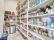 Large walk-in pantry offers abundant shelving for storage at 3220 W Feather Sound Dr, Anthem, AZ 85086