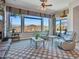 Relaxing Gathering room boasts expansive windows with scenic views at 3220 W Feather Sound Dr, Anthem, AZ 85086