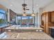 Updated kitchen with granite countertops and island seating at 3220 W Feather Sound Dr, Anthem, AZ 85086