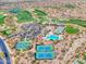 Aerial view of community amenities including tennis courts and pool at 3220 W Feather Sound Dr, Anthem, AZ 85086
