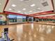 Spacious exercise room with wood floors and large mirrors at 3220 W Feather Sound Dr, Anthem, AZ 85086