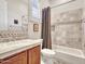 Clean bathroom with tub shower combo and tile flooring at 3220 W Feather Sound Dr, Anthem, AZ 85086