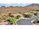 Aerial view of house and neighborhood with mountain backdrop at 3220 W Feather Sound Dr, Anthem, AZ 85086