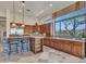 Gourmet kitchen boasts granite counters, ample cabinetry, and stainless steel appliances at 3220 W Feather Sound Dr, Anthem, AZ 85086