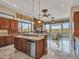 Modern kitchen with granite countertops and stainless steel appliances at 3220 W Feather Sound Dr, Anthem, AZ 85086