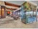 Elegant dining room with large windows and a wine display at 3220 W Feather Sound Dr, Anthem, AZ 85086