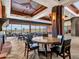 Elegant dining room with fireplace and large windows at 3220 W Feather Sound Dr, Anthem, AZ 85086