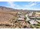 Community overview, showcasing surrounding homes and desert landscape at 3220 W Feather Sound Dr, Anthem, AZ 85086