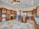 Gourmet kitchen features granite countertops, ample cabinetry, and an island at 3220 W Feather Sound Dr, Anthem, AZ 85086