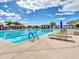 Swimming pool with lap lanes and shaded seating areas at 3220 W Feather Sound Dr, Anthem, AZ 85086