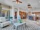 Open living room with views of the kitchen and backyard access at 3220 W Feather Sound Dr, Anthem, AZ 85086