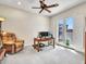 Home office with desk, comfortable chair, and backyard access at 3220 W Feather Sound Dr, Anthem, AZ 85086
