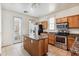 Kitchen features granite countertops, stainless steel appliances, and wood cabinets at 2794 S Alpine Dr, Gilbert, AZ 85295