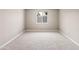 Bright bedroom featuring carpeted floors and a window at 12030 N 36Th St, Phoenix, AZ 85028