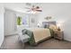 Spacious bedroom with a ceiling fan and neutral decor at 12030 N 36Th St, Phoenix, AZ 85028