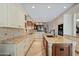 Spacious kitchen featuring granite countertops and custom cabinetry at 8989 N Gainey Center Dr # 114, Scottsdale, AZ 85258
