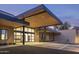 Modern building exterior with a covered entrance at 8989 N Gainey Center Dr # 114, Scottsdale, AZ 85258