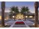 Attractive building entrance with landscaping and lighting at 8989 N Gainey Center Dr # 114, Scottsdale, AZ 85258