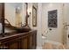 Elegant bathroom with unique sink and walk-in shower at 8989 N Gainey Center Dr # 114, Scottsdale, AZ 85258