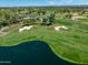 Community aerial view showing green spaces and clubhouse at 8989 N Gainey Center Dr # 114, Scottsdale, AZ 85258