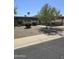 Ranch style home with gravel landscaping and driveway at 10617 W Deanne Dr, Sun City, AZ 85351