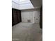 Spacious living room with built-in shelving and large windows at 10617 W Deanne Dr, Sun City, AZ 85351