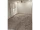 Bright and airy living room with a large window and doors at 10617 W Deanne Dr, Sun City, AZ 85351