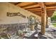 Front porch with stone accents and welcoming sign at 6614 W Sweetwater Ave, Glendale, AZ 85304