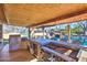 Outdoor kitchen features a grill, stovetop and bar seating at 6614 W Sweetwater Ave, Glendale, AZ 85304