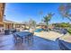 View of the pool and patio area with outdoor dining at 6614 W Sweetwater Ave, Glendale, AZ 85304