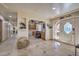 Elegant entryway with view into home office at 6614 W Sweetwater Ave, Glendale, AZ 85304