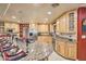 Large kitchen with granite countertops and an abundance of cabinetry at 6614 W Sweetwater Ave, Glendale, AZ 85304