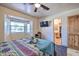 Main bedroom with large window, ensuite bathroom, and ample closet space at 6614 W Sweetwater Ave, Glendale, AZ 85304
