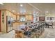 Spacious kitchen with large island, granite countertops, and stainless steel appliances at 6614 W Sweetwater Ave, Glendale, AZ 85304