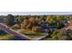 Aerial view of the home, highlighting the landscaping and street view at 6614 W Sweetwater Ave, Glendale, AZ 85304