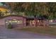 Charming home with stone accents and a welcoming front porch at 6614 W Sweetwater Ave, Glendale, AZ 85304