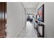 Bright and airy entryway with tile floors, leading to the living area at 41758 W Cribbage Rd, Maricopa, AZ 85138
