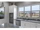 Modern kitchen with stainless steel appliances and granite countertops at 41758 W Cribbage Rd, Maricopa, AZ 85138