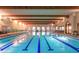 Inviting swimming pool with multiple lap lanes and seating area at 41758 W Cribbage Rd, Maricopa, AZ 85138