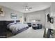 Large main bedroom with sitting area and walk-in closet at 41758 W Cribbage Rd, Maricopa, AZ 85138