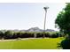 Landscaped backyard with artificial turf and mountain views at 6271 E Horseshoe Rd, Paradise Valley, AZ 85253