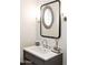 Elegant bathroom vanity with modern fixtures and a stained glass window at 6271 E Horseshoe Rd, Paradise Valley, AZ 85253