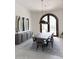 Elegant dining room with a long table and modern pendant lights at 6271 E Horseshoe Rd, Paradise Valley, AZ 85253