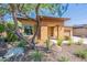 Modern home exterior with desert landscaping at 13234 W Hummingbird Ter, Peoria, AZ 85383